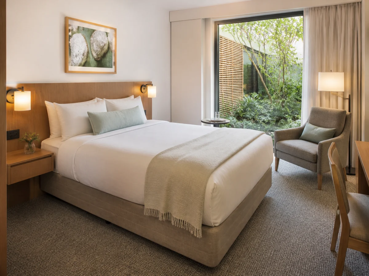 City Queen guest room at Plugoza Grand Hotel Mumbai